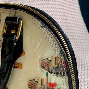 LOUIS VUITTON (COLLECTOR)
Alma "Sticker Animation" Handbag By Nicolas Ghesquière